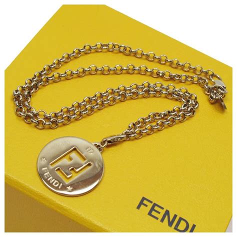 fendi ring gold and black|Fendi necklace gold.